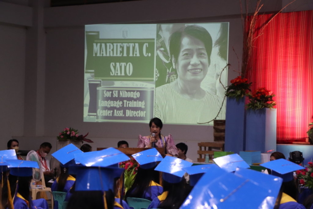 Mrs. Marietta C. Sato addresses the Nihongo Extension Class Grade 12 learners of SY 2021-2022 during the Rizal Integrated National School 5th Senior High School Graduation Ceremony.